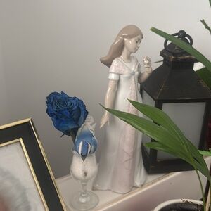 Little girl statue fromthe Noa handcrafted porcelain collection